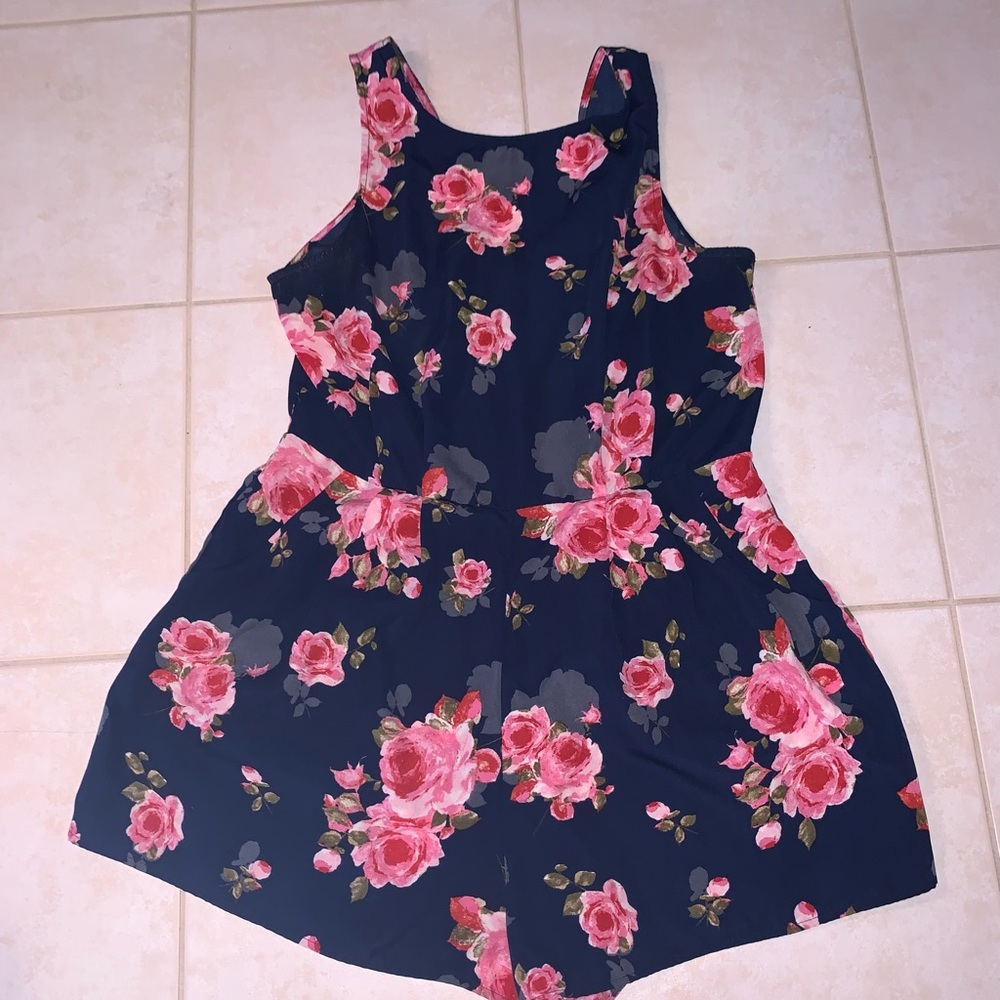 Very flattering navy floral romper perfect for summer occasions parties showers